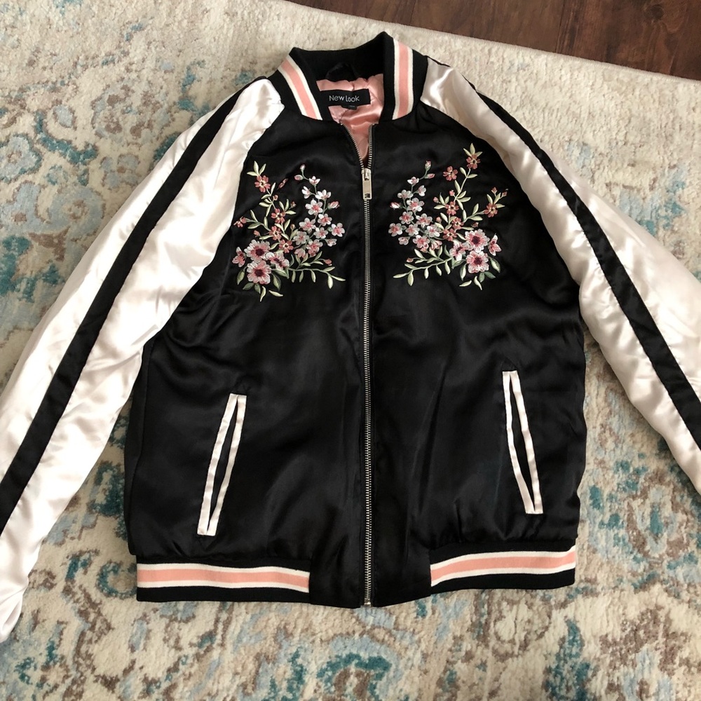 Adorable jacket. Never been worn